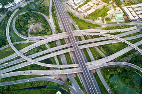 A city street shows structured pathways and direction.