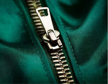 A zipper shows connection and disconnection of two sides.